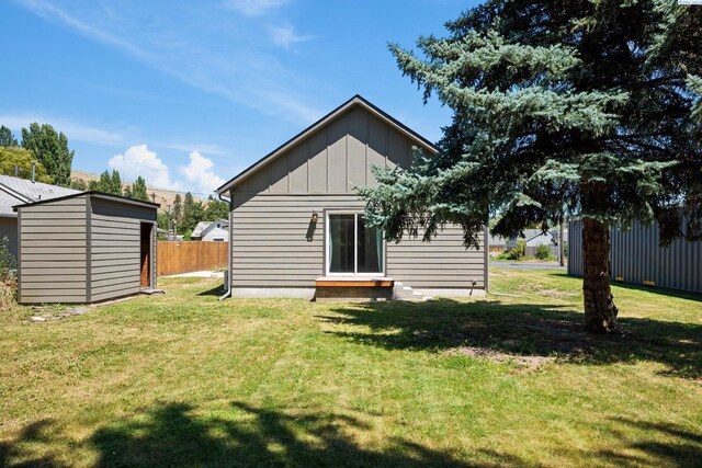 205 W 8th St, Colfax, WA 99111 - rear view of house featuring board and batten siding and a shed