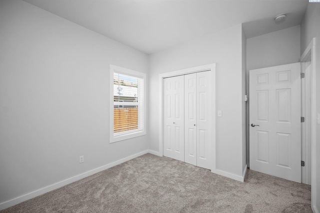 205 W 8th St, Colfax, WA 99111 - unfurnished bedroom featuring carpet flooring and a closet