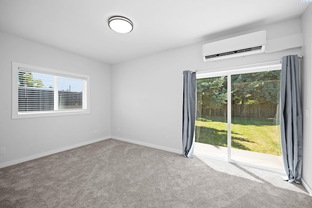 205 W 8th St, Colfax, WA 99111 - empty room with a wall mounted air conditioner and carpet