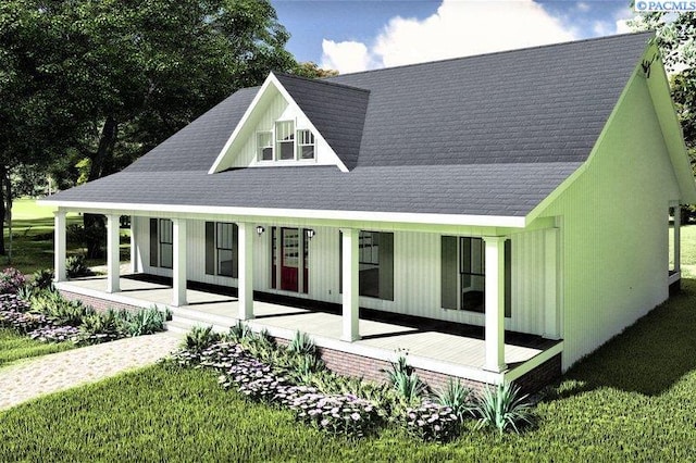 view of front of house with a porch and a front lawn