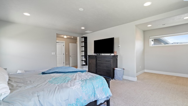 bedroom featuring baseboards, recessed lighting, and carpet
