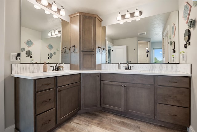 5901 W Ruby St, Pasco, WA 99301 - full bath with wood finished floors and double vanity