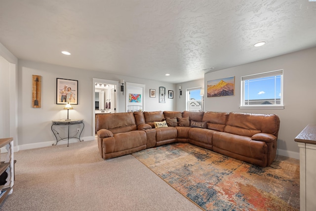 5901 W Ruby St, Pasco, WA 99301 - carpeted living area with baseboards, recessed lighting, and a textured ceiling