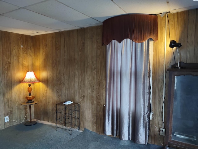 205 E 2nd St, Spangle, WA 99031 - sitting room with carpet floors, wooden walls, and a drop ceiling