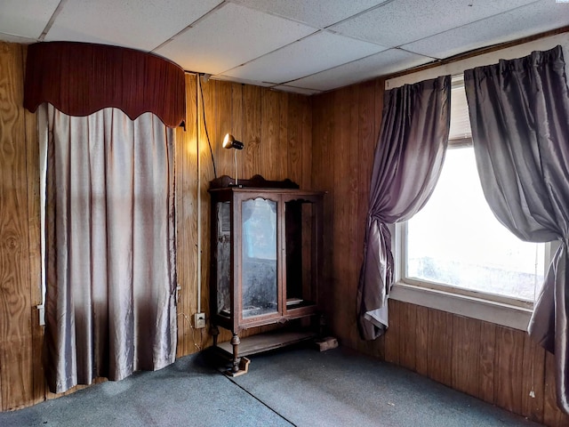 205 E 2nd St, Spangle, WA 99031 - carpeted spare room featuring wooden walls and a paneled ceiling