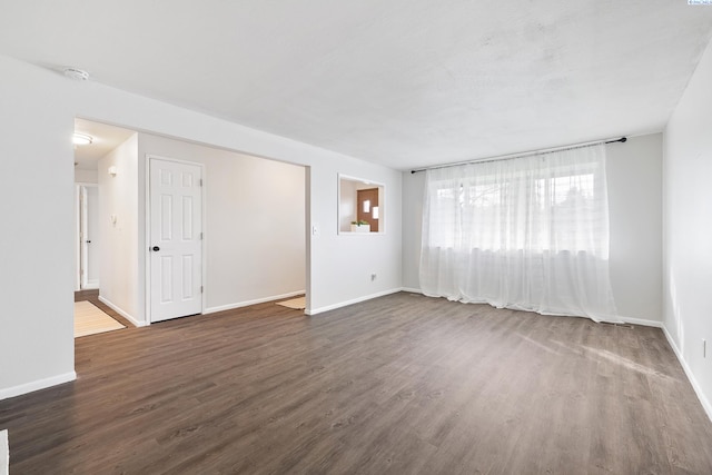 2128 Shasta Ave, Richland, WA 99354 - spare room with dark wood-style flooring and baseboards