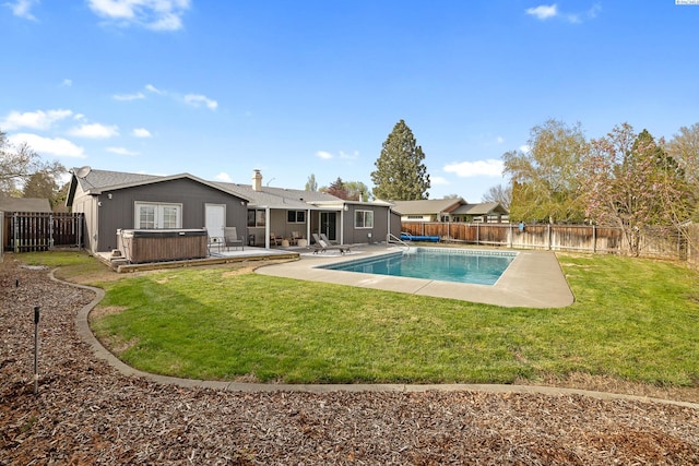 2128 Shasta Ave, Richland, WA 99354 - rear view of house with a fenced backyard, a fenced in pool, a patio, and a hot tub