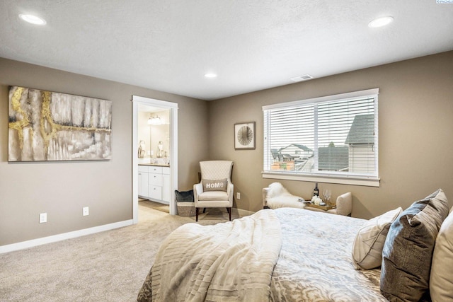 bedroom with baseboards, recessed lighting, visible vents, and light colored carpet