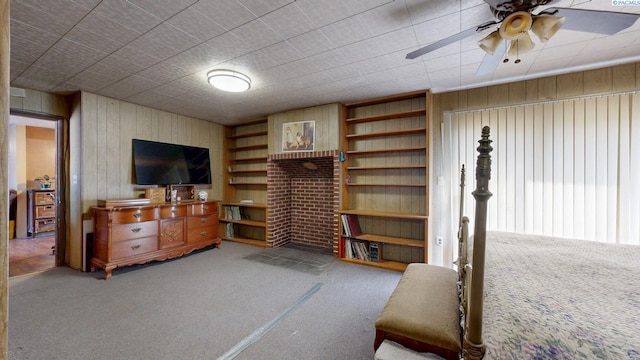 2816 S Cedar St, Kennewick, WA 99337 - bedroom with carpet, wooden walls, and a ceiling fan