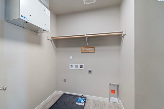 6223 Berea Ln, Pasco, WA 99301 - laundry area with hookup for a washing machine, hookup for an electric dryer, and wood finished floors