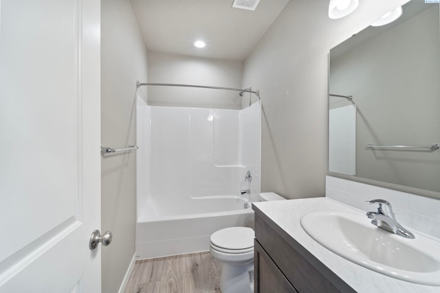 6223 Berea Ln, Pasco, WA 99301 - bathroom with vanity, bathtub / shower combination, wood finished floors, and decorative backsplash