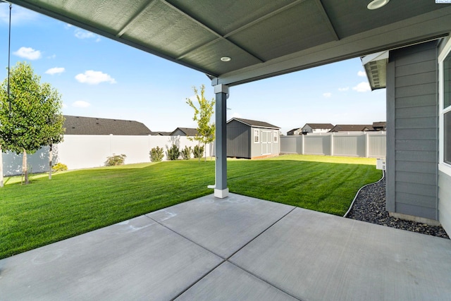 6223 Berea Ln, Pasco, WA 99301 - fenced backyard with a patio and a shed