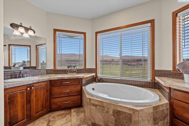 19408 Quail Run Pr SW, Prosser, WA 99350 - full bathroom featuring a garden tub and vanity