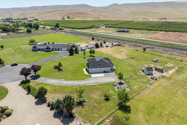 19408 Quail Run Pr SW, Prosser, WA 99350 - aerial overview of property's location featuring rural landscape, farmland, and a mountainous background