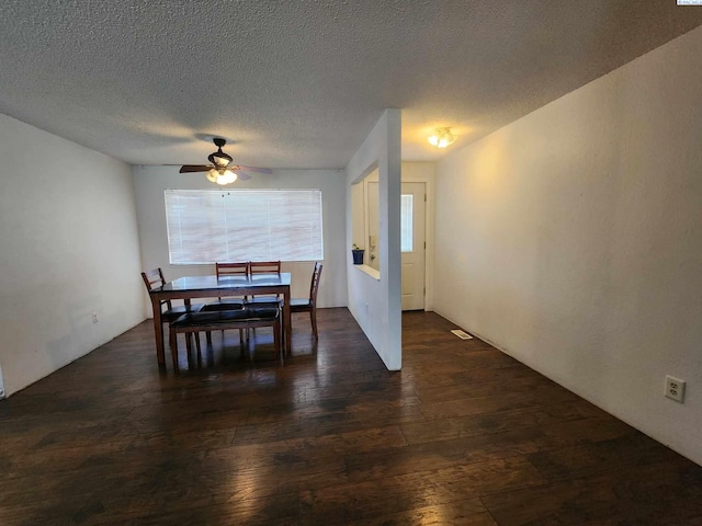 1106 Claire St, Prosser, WA 99350 - dining area with a ceiling fan, a textured ceiling, and dark wood-type flooring