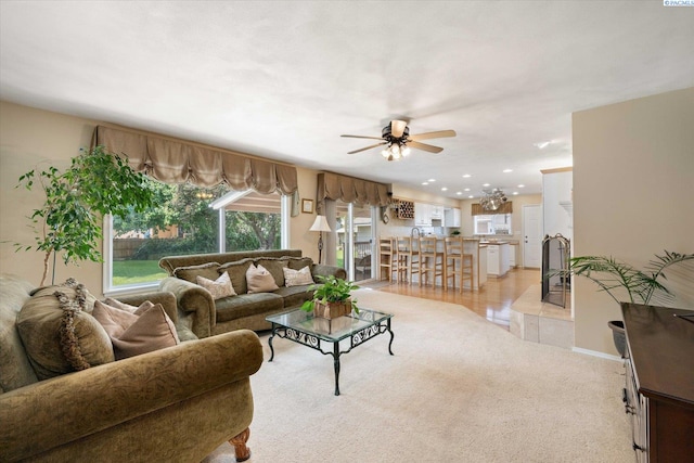 3916 S Date St, Kennewick, WA 99337 - living room with a ceiling fan, light carpet, and recessed lighting