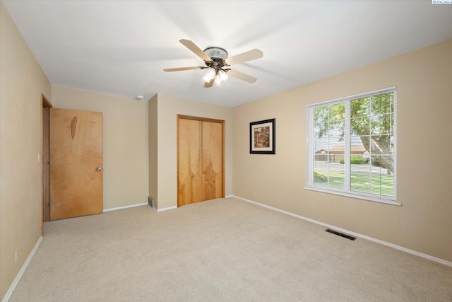 3916 S Date St, Kennewick, WA 99337 - unfurnished bedroom with a closet, carpet, and ceiling fan
