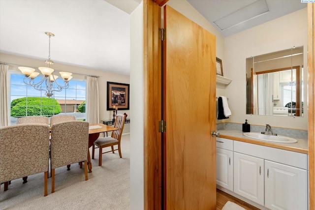 3916 S Date St, Kennewick, WA 99337 - bathroom featuring vanity and a chandelier