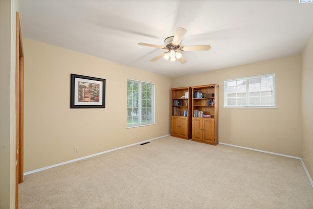 3916 S Date St, Kennewick, WA 99337 - spare room with light carpet and ceiling fan
