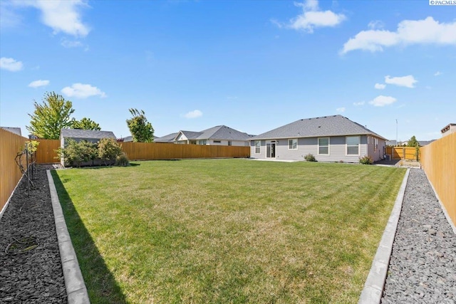 view of yard featuring a fenced backyard
