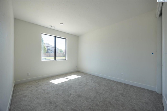 4218 W 19th Ave, Kennewick, WA 99337 - empty room featuring carpet and baseboards