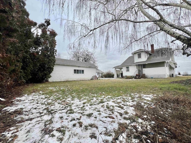 view of yard covered in snow