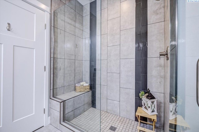 full bath with a shower stall