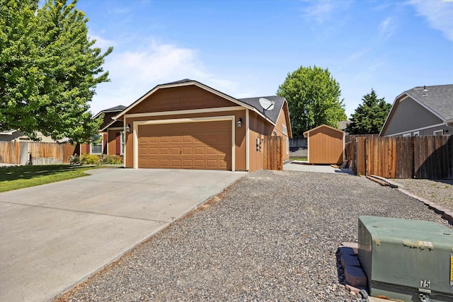 5168 Chris St, West Richland, WA 99353 - view of front of house featuring a garage and driveway