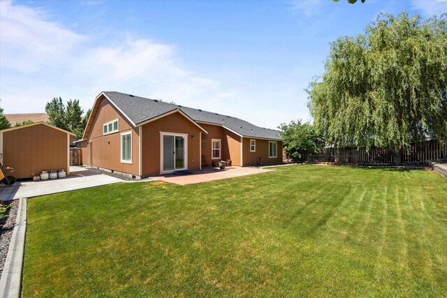 5168 Chris St, West Richland, WA 99353 - rear view of house featuring a patio area and an outdoor structure