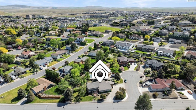 aerial view featuring a residential view and a mountain view