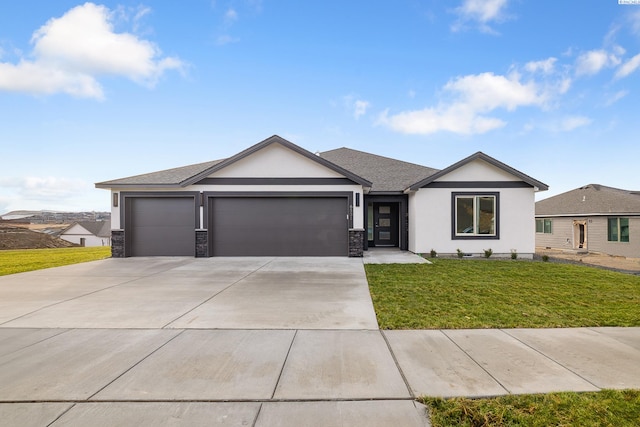 6531 W 30th Pl, Kennewick, WA 99338 - single story home featuring an attached garage, a front yard, stucco siding, driveway, and roof with shingles