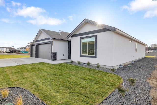 6531 W 30th Pl, Kennewick, WA 99338 - ranch-style home with stucco siding, concrete driveway, a front lawn, and a garage
