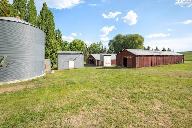 47001 Sr 27, Tekoa, WA 99033 - view of grassy yard with an outbuilding, a pole building, and a detached garage