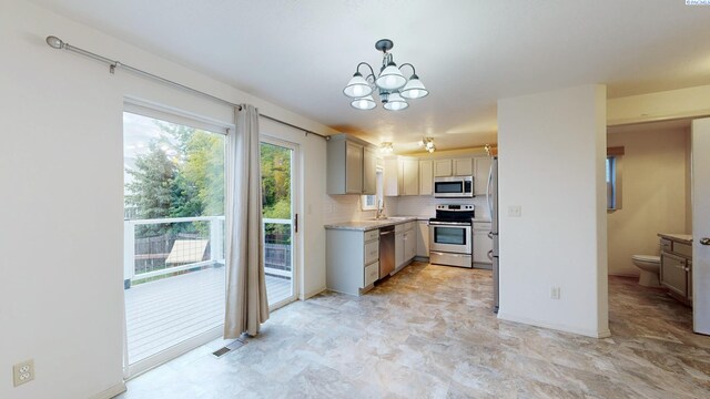 1625 NW Valhalla Dr, Pullman, WA 99163 - bathroom featuring washer and dryer, vanity, and backsplash