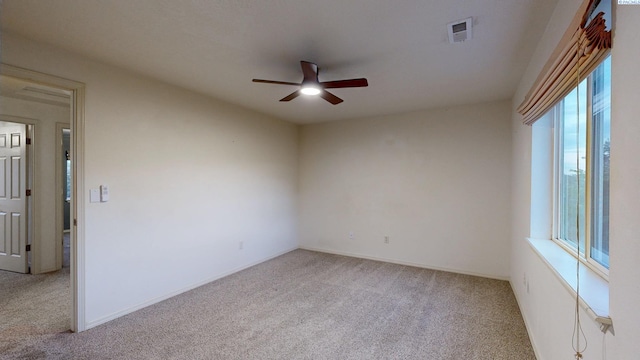 1625 NW Valhalla Dr, Pullman, WA 99163 - empty room with ceiling fan, carpet floors, and baseboards