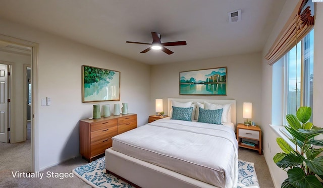 1625 NW Valhalla Dr, Pullman, WA 99163 - bedroom with light colored carpet and a ceiling fan