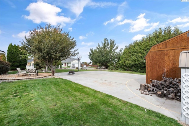 exterior space featuring a fire pit and a patio