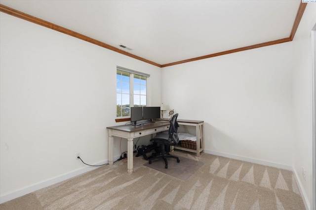 office area featuring light carpet, baseboards, visible vents, and crown molding