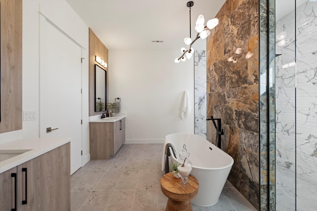 bathroom featuring vanity and a bathing tub