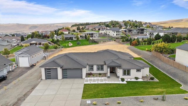 drone / aerial view featuring a mountain view