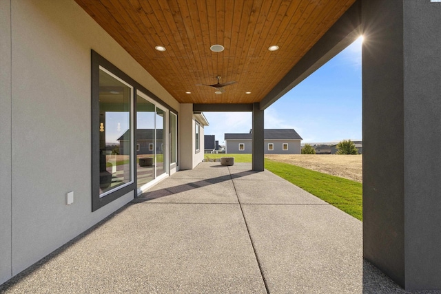 view of patio / terrace featuring ceiling fan