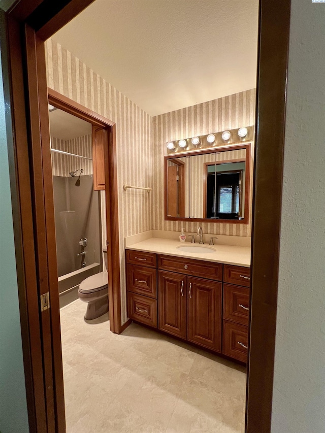 full bathroom with vanity, toilet, and bathing tub / shower combination