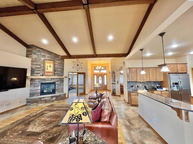 living room featuring high vaulted ceiling, a stone fireplace, and beam ceiling