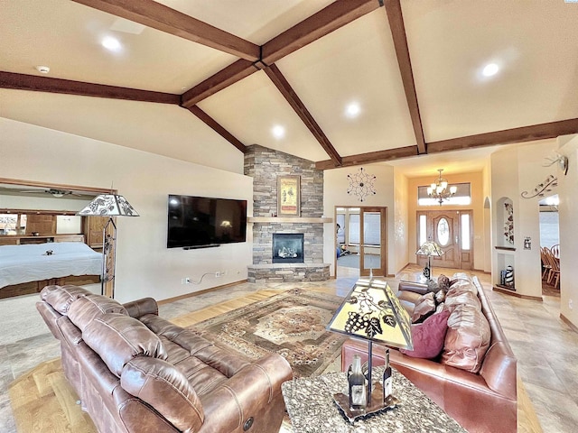 living room featuring high vaulted ceiling, a chandelier, a stone fireplace, and beam ceiling