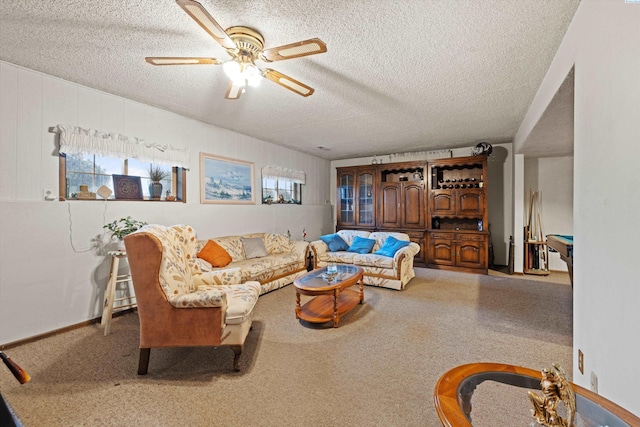 697 Conrad Rd, Touchet, WA 99360 - carpeted living room with a textured ceiling and ceiling fan