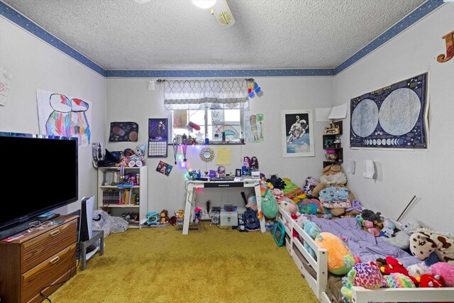 697 Conrad Rd, Touchet, WA 99360 - bedroom featuring carpet flooring, a textured ceiling, and a ceiling fan
