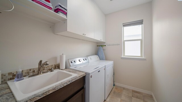 8902 Sophie Rae Ct, Pasco, WA 99301 - laundry room with washer and dryer and cabinet space