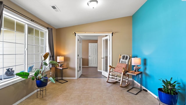 5706 Wrigley Dr, Pasco, WA 99301 - sitting room featuring lofted ceiling, baseboards, and french doors