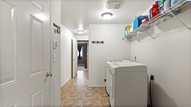 5706 Wrigley Dr, Pasco, WA 99301 - laundry area with independent washer and dryer and baseboards