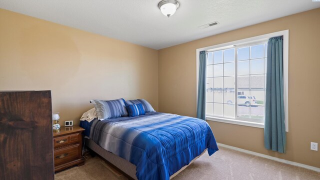 5706 Wrigley Dr, Pasco, WA 99301 - bedroom featuring carpet flooring and baseboards